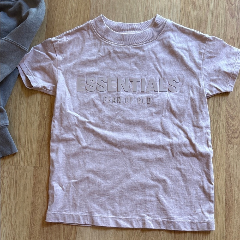 Essentials fear of god pink shirt size 4/5. XS